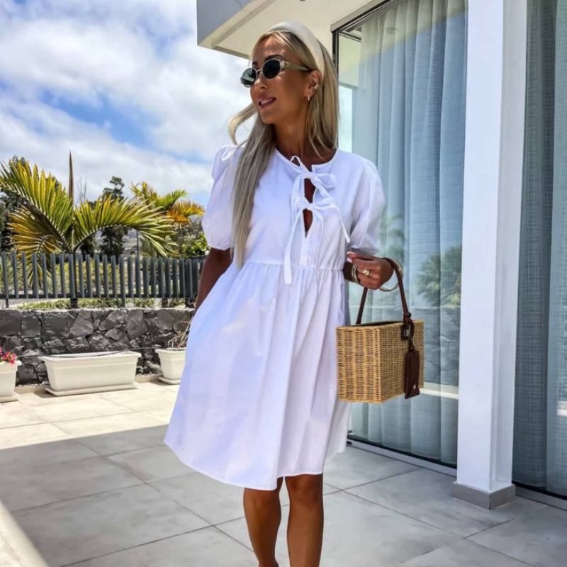 robe de femme unie à la mode avec nœud sur le devant et manches bouffantes