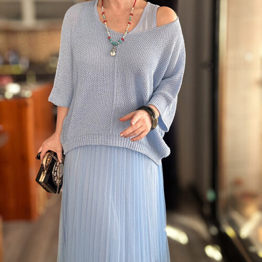 Ensemble chic composé d'une robe gilet et d'un haut cache-cœur