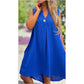 Robe à col en V sans manches à couleurs unis avec décoration de bouton