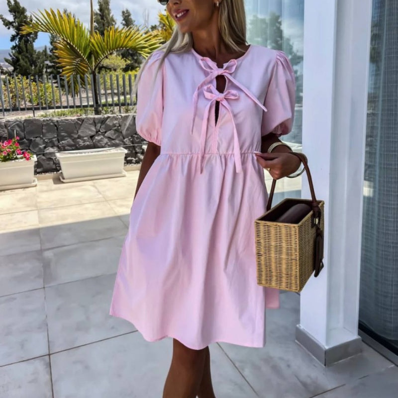 robe de femme unie à la mode avec nœud sur le devant et manches bouffantes