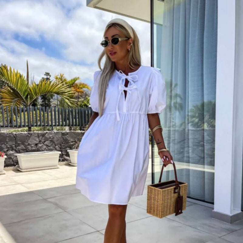 robe de femme unie à la mode avec nœud sur le devant et manches bouffantes