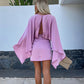 Robe dos nu avec manches chauve-souris