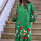 Elégante robe pour femme avec motif floral et col rond