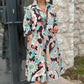 Robe colorée à manches 3/4 avec imprimé floral vintage et poches