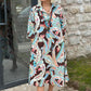 Robe colorée à manches 3/4 avec imprimé floral vintage et poches