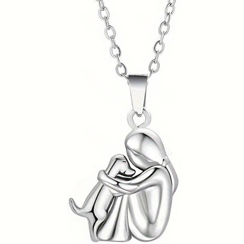 Petite Fille Câlinant un Chien – Clous d’Oreilles et Collier