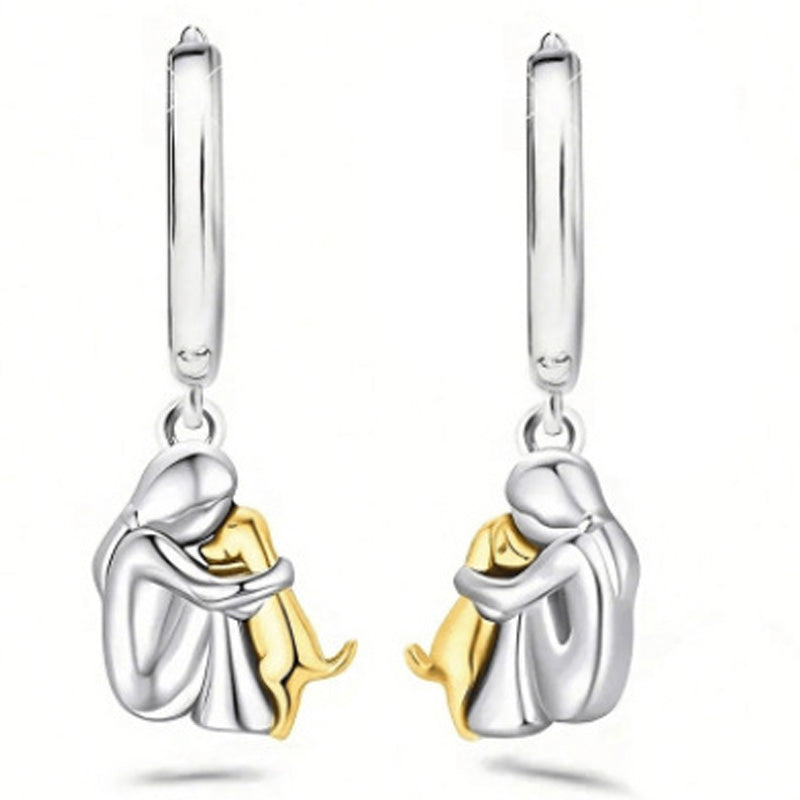 Petite Fille Câlinant un Chien – Clous d’Oreilles et Collier