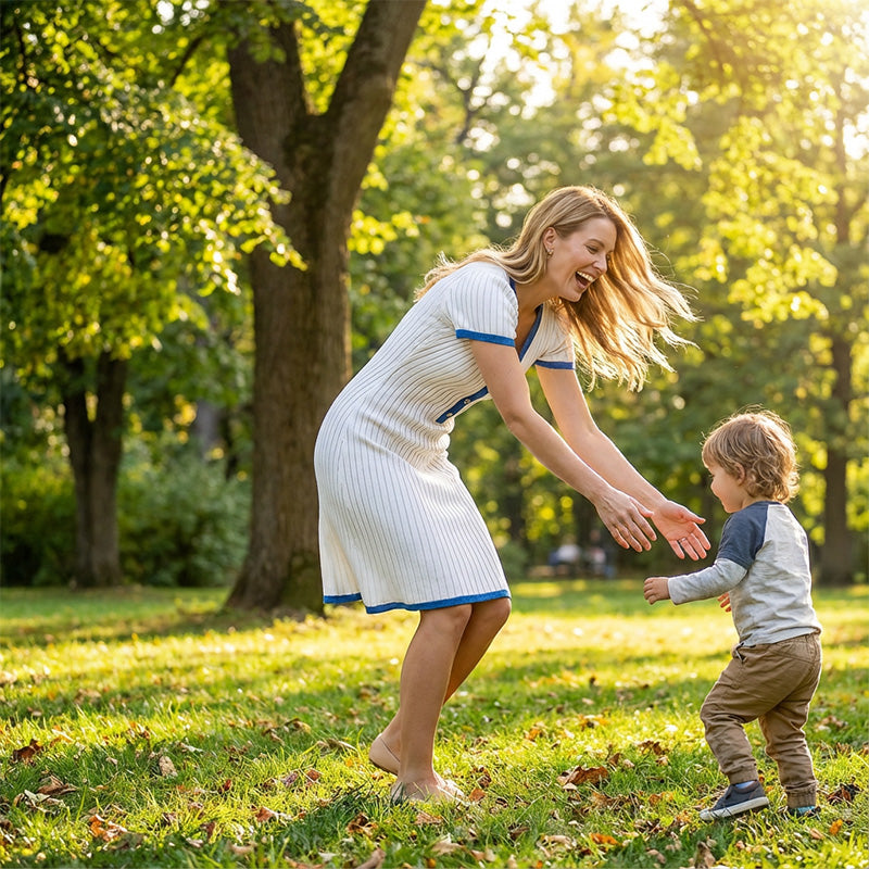 Robe en maille rayée à encolure en V et longueur genou pour femmes