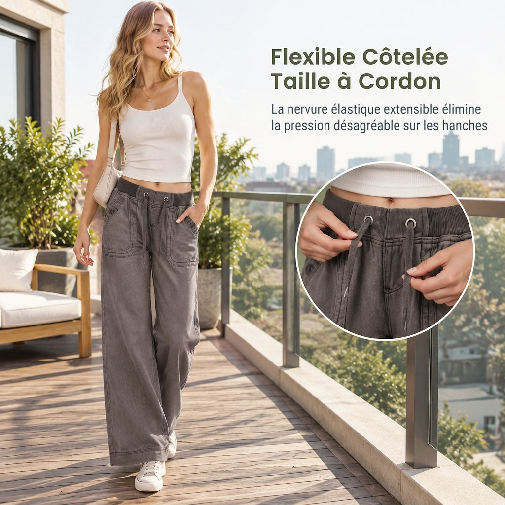 Jean American Vintage taille basse légèrement évasé, avec ceinture élastiquée à cordonnet et poches patteilleuses